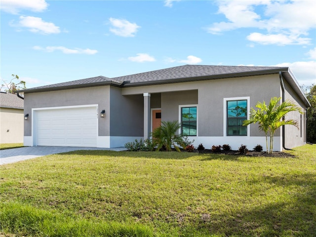 view of front facade featuring a garage and a front yard