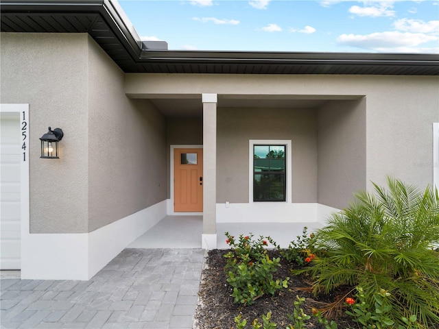 property entrance with a garage