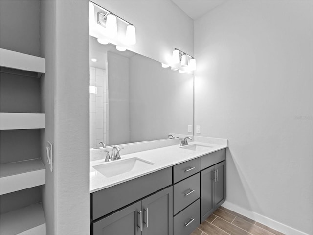 bathroom featuring vanity and hardwood / wood-style flooring