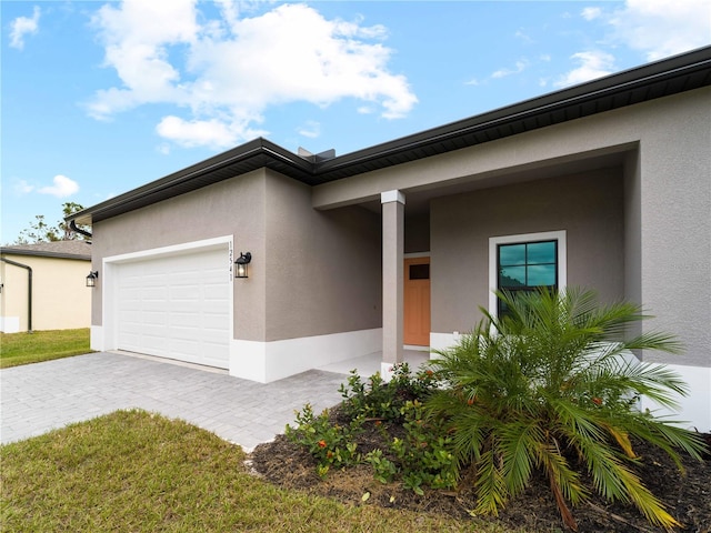 view of front of home with a garage