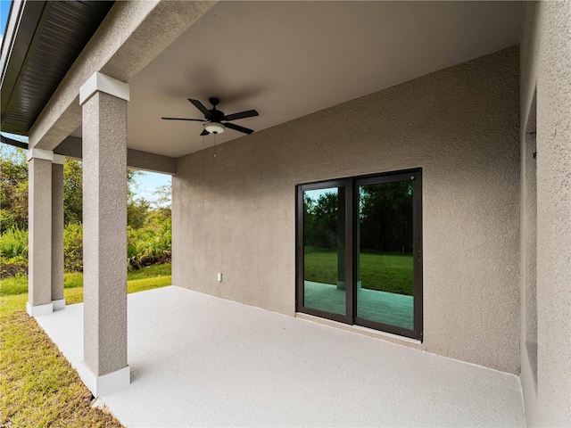 view of patio / terrace featuring ceiling fan