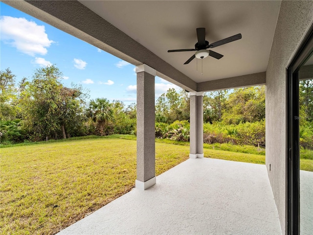 view of patio / terrace featuring ceiling fan