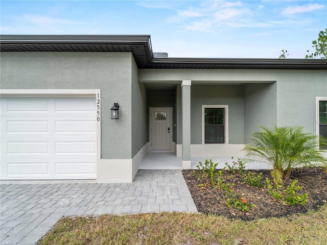 property entrance with a garage