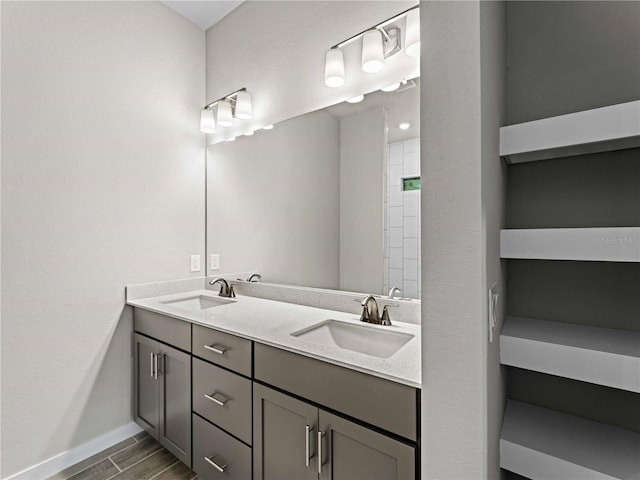 bathroom featuring vanity and hardwood / wood-style floors