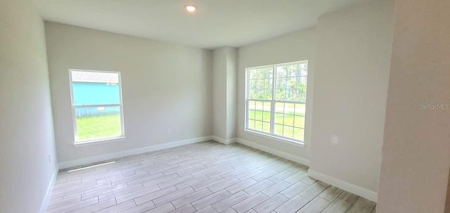 empty room featuring light hardwood / wood-style floors