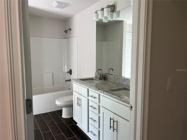 full bathroom featuring vanity, toilet, and shower / bathing tub combination