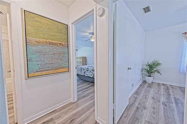 hallway featuring light hardwood / wood-style floors