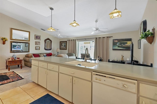 kitchen featuring ceiling fan, sink, white dishwasher, and light carpet