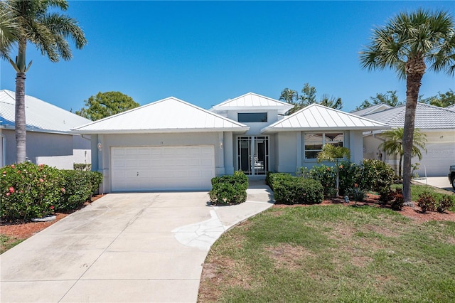 single story home with a garage