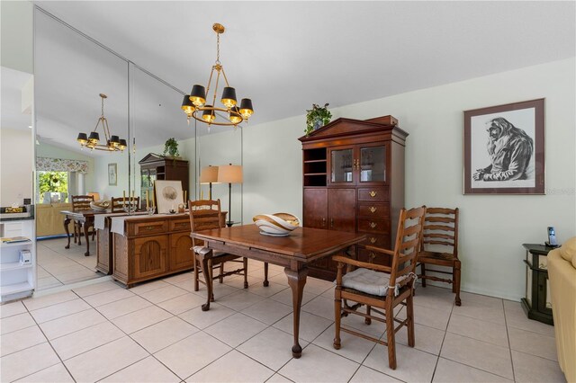 tiled office space with a notable chandelier and vaulted ceiling