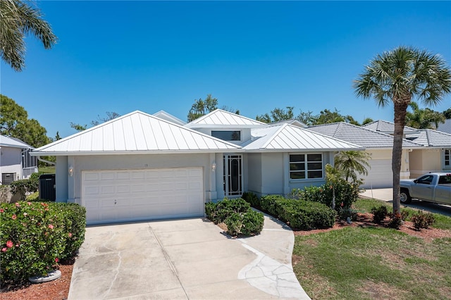 single story home with a garage