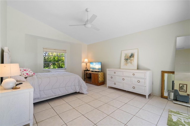 tiled bedroom with vaulted ceiling and ceiling fan