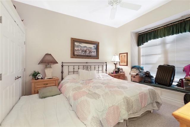 bedroom with carpet flooring, a closet, and ceiling fan