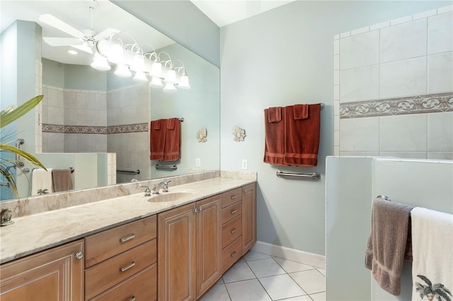 bathroom featuring tile floors, ceiling fan, and vanity