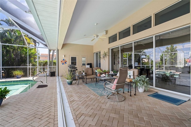 view of patio with a lanai and ceiling fan