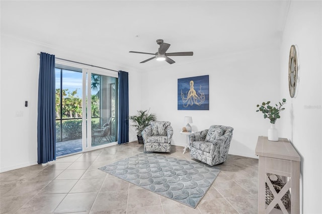 interior space with ceiling fan, light tile flooring, and ornamental molding