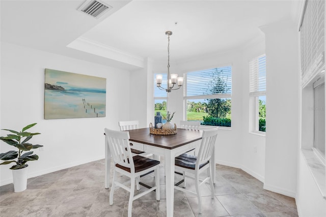 dining space featuring ornamental molding, visible vents, baseboards, and an inviting chandelier