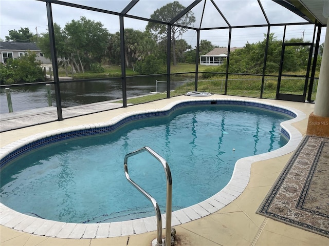 view of pool with a lanai