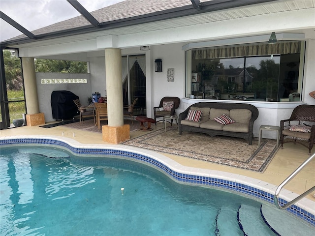 view of swimming pool with an outdoor living space, a patio, and area for grilling