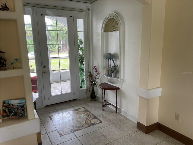 entryway featuring light tile patterned flooring