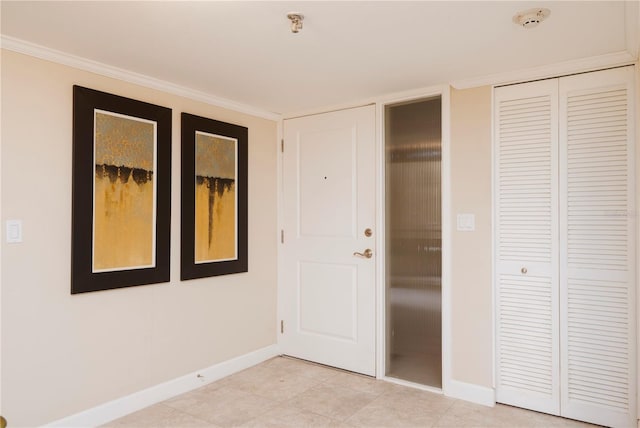 unfurnished bedroom with crown molding and light tile patterned floors