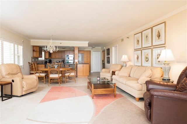 living room featuring crown molding and a notable chandelier