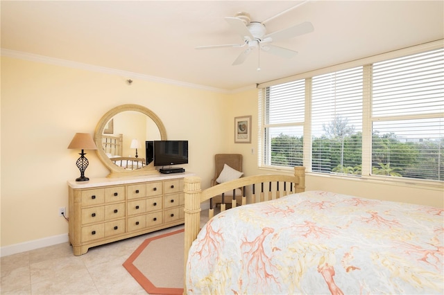 tiled bedroom featuring ceiling fan and ornamental molding