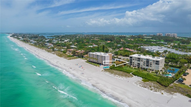 aerial view with a water view and a view of the beach