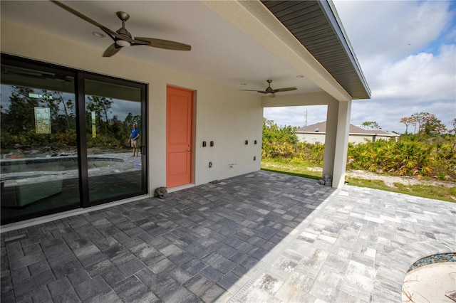 view of patio / terrace featuring ceiling fan