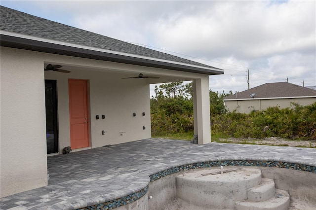 view of patio / terrace featuring ceiling fan