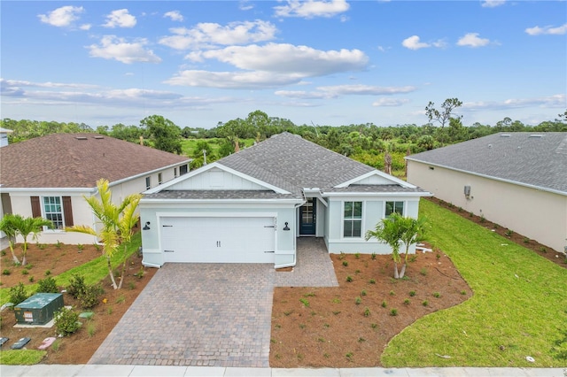 single story home featuring a front yard and a garage