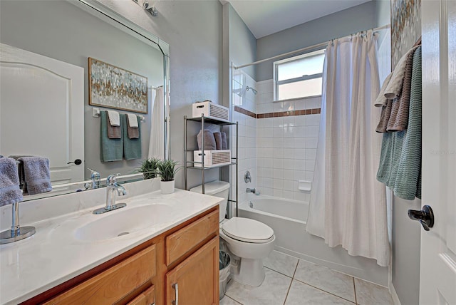 full bathroom featuring tile flooring, shower / tub combo, vanity, and toilet