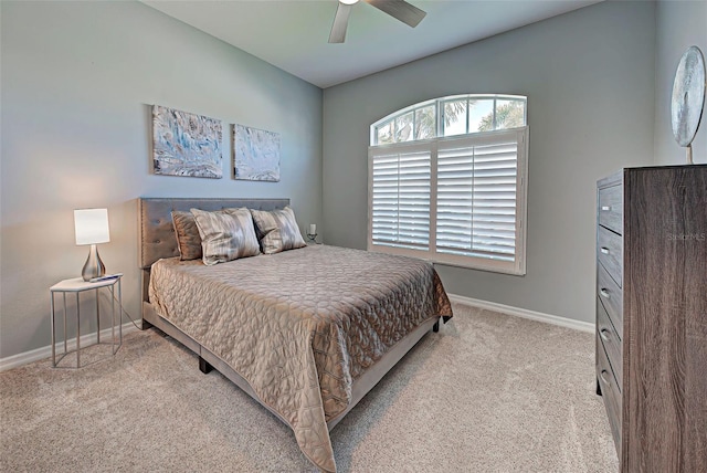 bedroom with light colored carpet and ceiling fan