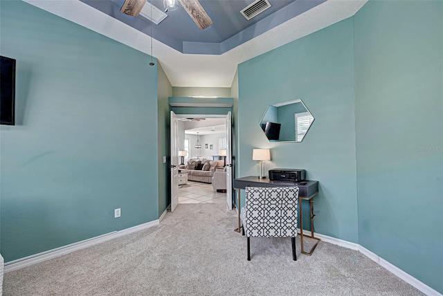 office with light colored carpet and ceiling fan