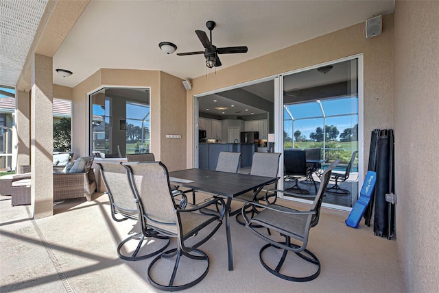 view of patio / terrace with ceiling fan