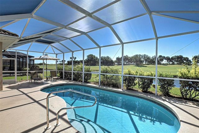 view of pool featuring a lanai and a patio area