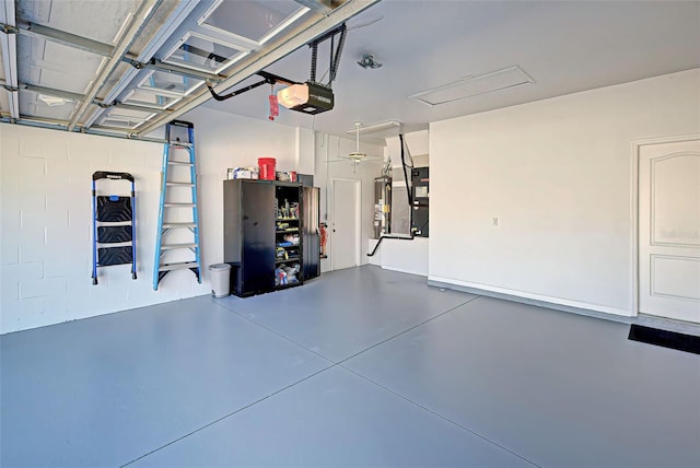 garage featuring a garage door opener