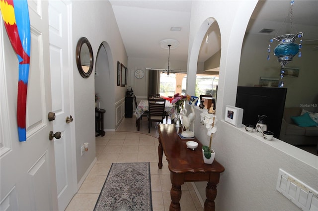 foyer featuring light tile floors