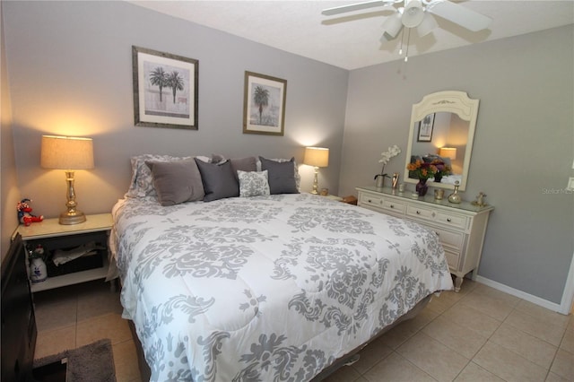 tiled bedroom featuring ceiling fan