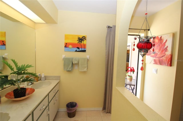 bathroom with oversized vanity and tile flooring