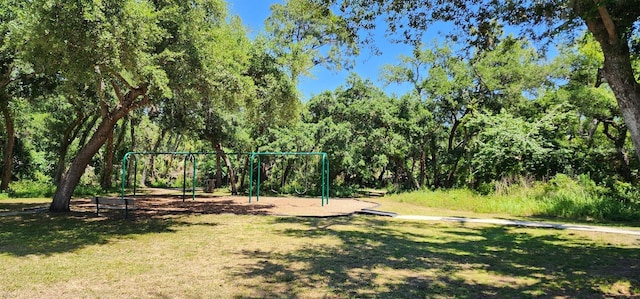 view of nearby features with a yard and a playground