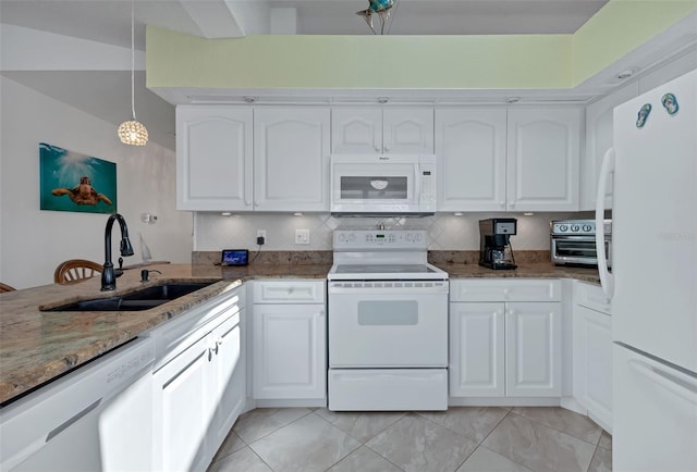 kitchen featuring white cabinets, white appliances, light tile floors, stone countertops, and sink