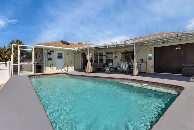 view of swimming pool featuring a patio