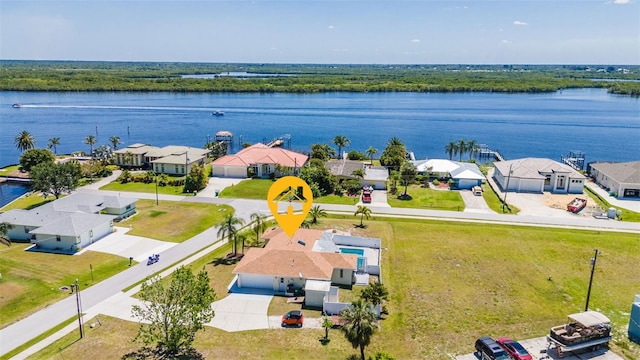 birds eye view of property featuring a water view