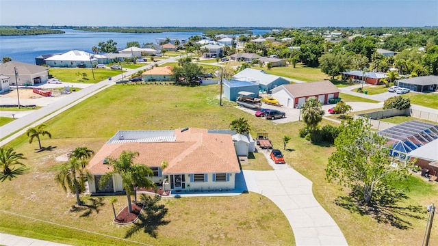 bird's eye view with a water view