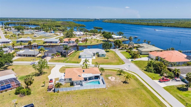 drone / aerial view with a water view