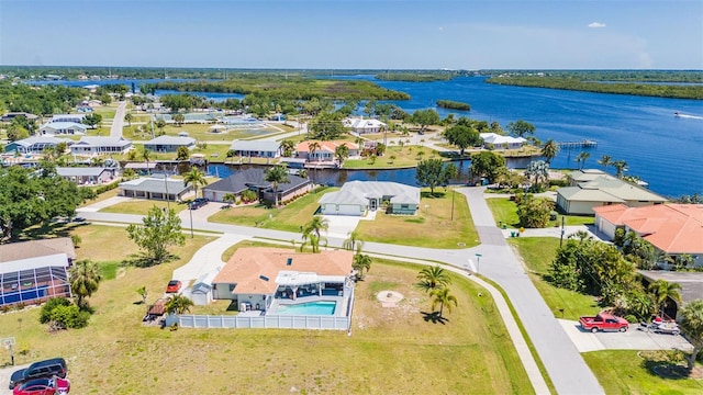 drone / aerial view with a water view