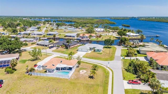 drone / aerial view with a water view