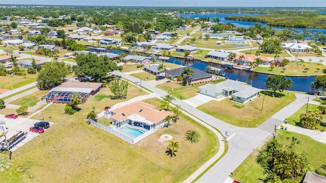 drone / aerial view with a water view