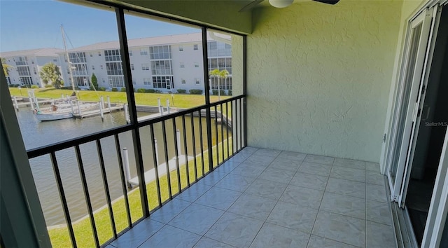 balcony featuring a water view